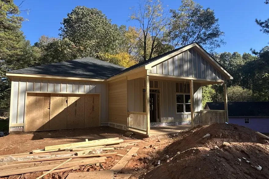 Stick-built framing and roof line standing on a metro Atlanta job site